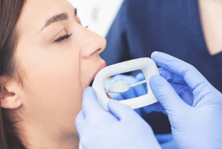 how long to keep gauze in after tooth extraction